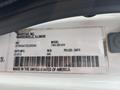 Label from a 2013 International WorkStar truck showing VIN model and manufacturing details