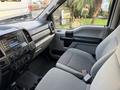 Interior view of a 2018 Ford F-350 truck showing the driver's seat dashboard and control panel
