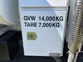 A white side panel of a 2008 International DuraStar truck displaying specifications including GVW 14000KG and TARE 7000KG