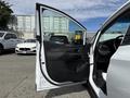 A 2023 Chevrolet Bolt EV with its front door open showcasing the interior features and design of the car