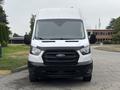 Front view of a white 2020 Ford Transit 250 van with a black grille and no visible logos or markings