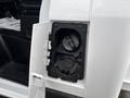Close-up of the fuel cap on a 2023 RAM Promaster 3500 showing the cap assembly and fuel gauge inside