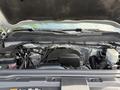 Image shows the engine compartment of a 2016 Chevrolet Silverado 2500HD with various components including the engine block and associated parts visible