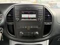 The dashboard of a 2020 Mercedes-Benz Metris featuring a control panel with buttons for audio phone and system settings along with a display screen