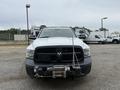 A white 2016 RAM 1500 pickup truck with a black front grille and a winch attached to the bumper
