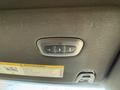 Control buttons for a sunroof on the interior roof of a RAM 3500 2023