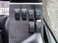 Control panel of a 2019 Madvac LS175 featuring six buttons labeled for fan water pump washdown and close functions