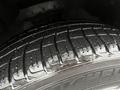 Close-up of a new tire from a 2016 Subaru Forester showing deep tread patterns and smooth surface designed for traction and handling