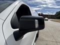 A 2019 Chevrolet Silverado 1500 displaying the side mirror from a close angle