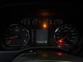 Dashboard of a 2017 GMC Sierra 3500HD displaying speedometer tachometer and odometer with warning lights illuminated