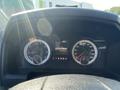 Dashboard of a 2015 RAM 2500 displaying speedometer and fuel gauge along with a message center showing mileage and gear selection