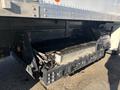 A 2022 Lion Lion6 truck with a visible battery pack mounted underneath the vehicle showcasing its electric power system