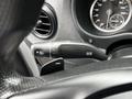 Close-up of a 2020 Mercedes-Benz Metris steering column with indicator and wiper controls visible alongside a speedometer and air vent