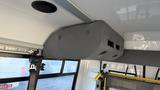 Interior ceiling storage compartment in a 2021 Ford Transit with a padded gray exterior and ventilation openings