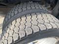 Close-up of the tread on a large tire from a 2016 RAM 5500 showcasing its rugged pattern and wear