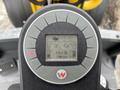 Display panel of a 2014 Wacker Neuson WL34 showing vehicle diagnostics including hours of operation and RPM