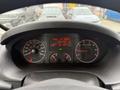 Dashboard of a 2020 RAM Promaster displaying gauges for speed, fuel, and engine temperature along with a digital clock and date