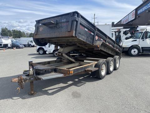 2009 Load 16 foot Dump Trailer with a black metal body and a hydraulic lift system supported by three axles and a hitch at the front