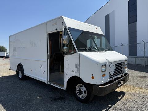 A 2012 Ford Econoline box truck with a white exterior featuring a large cargo area and an open driver's side door