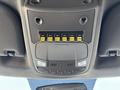 Control panel with multiple switches labeled for various functions in a 2017 Ford F-550