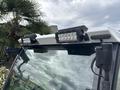 A 2019 Madvac LS175 with dual LED light bars mounted on the roof and a transparent windshield in the foreground