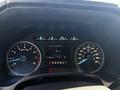 Dashboard of a 2018 Ford F-150 displaying speedometer fuel gauge and digital speed information