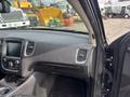 Interior view of a 2015 Dodge Durango featuring a central console with a touchscreen display and control buttons