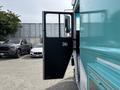 A 2020 Freightliner MT45 food truck with its door open revealing the interior and driver's seat