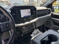 Interior view of a 2021 Ford F-150 showing the dashboard with a touchscreen display and controls