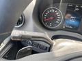 Close-up of the dashboard controls of a 2024 Mercedes-Benz Sprinter with a speedometer and various indicator lights displayed on the screen