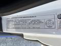 A 2017 Chevrolet Colorado with a vehicle information label detailing specifications such as tire pressure, tire size, and load capacity