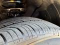 Close-up of a tire with visible tread patterns from a 2018 Kia Rio5