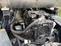 A 2020 Hyundai HR110C engine with visible metal components including hoses switches and a circular filter