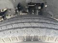 Close-up of a tire tread from a 2018 Ford F-750 showing detailed patterns and grooves designed for traction