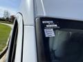 A 2016 Mercedes-Benz Sprinter with an inspection sticker on the windshield showing approval dates and months from January to April
