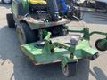2012 John Deere 1445 SERIES II 4WD featuring a prominent mower deck with a green and rusted finish and a sturdy frame designed for landscaping tasks