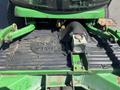 Top view of a 2016 John Deere 1585 Terrain Cut lawn mower showcasing the engine compartment and a warning label reading NO STEP