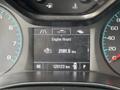 The dashboard of a 2018 Chevrolet Colorado displaying engine hours at 2101.5 hours and mileage at 120123 km