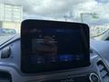 A 2021 Ford Transit Connect dashboard display showing options for connecting a device and finding mobile apps
