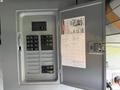 A 2007 Ford F-550 vehicle dashboard with a visible electrical panel showing multiple circuit breakers and labels indicating their purposes