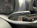 A gear shift lever with R N D and P indicators for a 2023 Mercedes-Benz Sprinter positioned near the dashboard controls