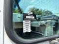 A certificate of approval sticker on the window of a 2011 Workhorse W62 showing months from January to June with a 2027 expiration date
