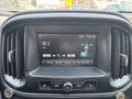 Dashboard of a 2017 Chevrolet Colorado showing a digital display with radio frequency 99.3 and time 12:41 AM