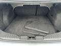A 2018 Ford Focus trunk featuring a clean, empty space with two black rubber floor mats placed inside