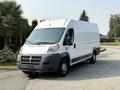 White 2017 RAM Promaster van with a boxy shape and large windshield parked on a driveway