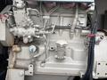 A 2005 Katolight SED60FPJ4 generator engine with various pipes valves and a fuel pump visible in the foreground