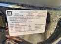 A 2007 Cadillac Escalade vehicle information label showing details about its manufacturing and specifications