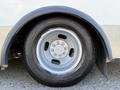 Close-up of a 2017 Chevrolet Express wheel with a silver rim and black tire showing tread pattern