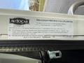A label on a 2010 Autocar Xpeditor providing vehicle noise emission control information and details about maintenance and compliance with the Noise Control Act