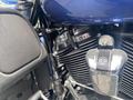 Close-up of a 2017 Harley-Davidson FLHTKL engine showcasing the chrome-plated components and black engine casing